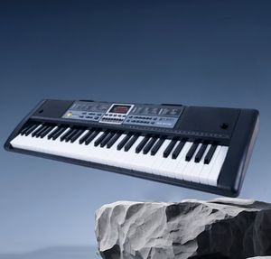 Órgano eléctrico vocal Edad de oro 61 teclas modelo de enseñanza de luz portátil multifunción para niños - Product Image 5