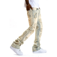 Pantalon en tissu denim de haute qualité, style streetwear, design déchiré, jambe évasée superposée, jeans avec patchs brodés personnalisés, jeans pour hommes