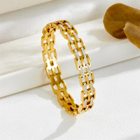 Bracelet en fer inaltérable et étanche avec accents de diamants, motifs ajourés, accessoire haut de gamme sophistiqué, minimaliste et chic