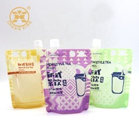 Vente chaude d'usine pour la vente en gros de sachets à bec verseur transparents en plastique pour boissons avec buse d'aspiration, sac à eau en nylon transparent de 2,5 L