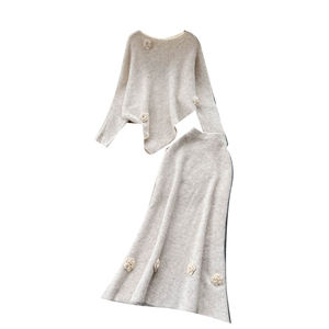 Осенний элегантный комплект из 2 предметов для женщин: асимметричный топ и юбка с высокой талией из 3D-вязки, оптовая продажа - Product Image 5