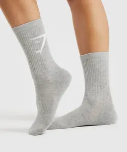 ถุงเท้าใส่เล่นกีฬาสำหรับผู้ชายและผู้หญิงทำจากโพลีเอสเตอร์บุนวม