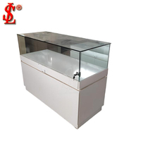 Vitrine de présentation de bijoux incurvée de luxe, comptoir circulaire en verre, couleur or champagne, solution complète pour boutique, aménagement de boutique