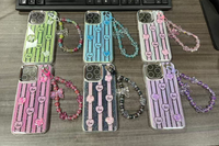 Coque de téléphone scintillante en TPU avec chaîne et motif papillon pour iPhone 18 17 16 15 14 13, coque arrière brillante pour Samsung A08 A18 A17 A07 A15 A05