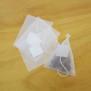 Bolsas de té vacías de forma <span class=keywords><strong>triangular</strong></span> de malla <span class=keywords><strong>PLA</strong></span> portátil con etiqueta e hilo para bolsas de té de hojas sueltas - Product Image 4