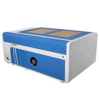 Machine de découpe laser CNC CO2 100W 1060 Prix 50W 80W 100W 130W 150W 1000x600mm Machine de gravure laser sur objets ronds