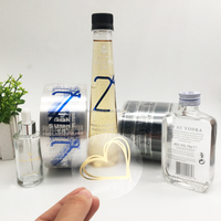 Étiquettes autocollantes personnalisées en vinyle transparent pour bouteilles de jus et de boissons