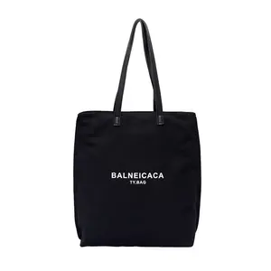 Nuova borsa Tote moda Casual con motivo a lettera Multi-tasca in tela uniesx con due spallacci