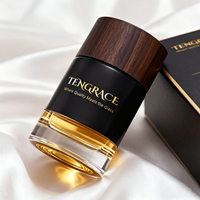 Flacon de parfum en verre de luxe avec bouchon en bois 30ml 50ml 100ml Contenant vide pour vaporisateur de parfum avec logo personnalisé pour l'emballage