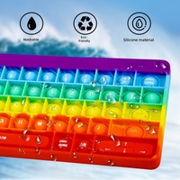 Nouveauté transfrontalière : Clavier réaliste arc-en-ciel, grand jouet anti-stress en silicone à bulles à éclater