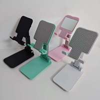 Support de téléphone portable et tablette pliable multi-outils portable à bas prix, fonction flexible, support de bureau paresseux