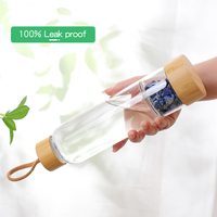 Logo personnalisé Bouteille d'eau en verre créative en cristal naturel infusé de pierres précieuses de guérison avec couvercle en bambou