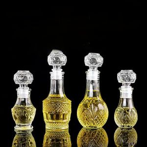 Bouteille en verre réutilisable personnalisée de 50ml & 100ml avec couvercle sculptures impression de logo pour thé vodka whisky boissons énergisantes <span class=keywords><strong>tequila</strong></span> boîtes emballées - Product Image 1