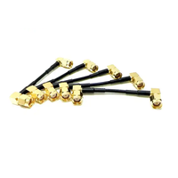 Suministro de fábrica SMA macho enchufe RA codo a RP Sma macho RA ángulo recto Rg174 Pigtail Jumper Cable montaje ROHS 30cm en Stock