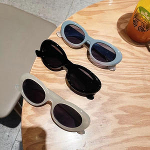 Gafas de Sol Qianai Cat Eye H5-2202, Montura Azul, Protección UV400, Unisex, Estilo Urbano Moderno, Diseño Irregular - Product Image 4