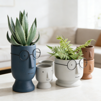 Joli pot de fleurs en céramique en forme de visage avec un design de poupée pour la décoration de la maison et du jardin, ensemble de pots pour plantes succulentes sur le bureau
