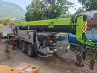 Vente directe de grue montée sur camion d'occasion 95% neuve 100T, moteur Weichai Yuchai, bras télescopique à 6 sections, stock efficace