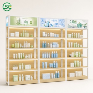 Estantería de Exhibición para Minoristas con Acabado en Madera Blanca y Paneles Luminosos para Tiendas de Cosméticos - Product Image 1