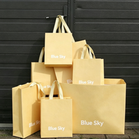 Sac cadeau en papier kraft rose pour mariage avec poignée en ruban, emballage artisanal de luxe écologique