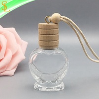Bouteille diffuseur de parfum d'huiles essentielles pour voiture, vide, en verre transparent en forme de cœur, 12 ml, à suspendre, avec bouchon à vis et corde, design givré