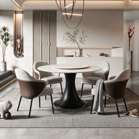Ensemble de meubles de salle à manger moderne de luxe léger avec table ronde en marbre et chaises à accoudoirs