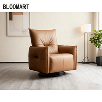Chaise pivotante inclinable en cuir avec cadre en bois éponge intégrée dans le moteur en acier au carbone noir mat plateau tournant canapé meubles
