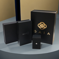 Boîte-cadeau en carton rigide de luxe noire personnalisée avec couvercle magnétique amovible pour l'emballage