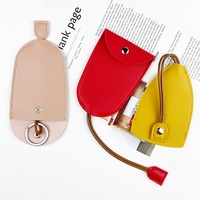 Pochette à clés de luxe en cuir PU multicolore, mini sac à clés à bouton-pression, étui à clés portable avec cordon de serrage, petite bourse à monnaie, logo personnalisé pour voiture