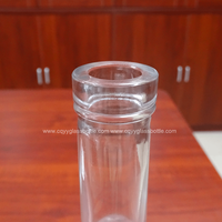 Bouteilles en verre transparentes cylindriques de 70 cl pour whisky, vodka et spiritueux à vendre