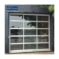Porte auto en alu vitre miroir sans cadre, usage commercial/résidentiel, isolation thermique, finie