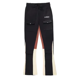 Nueva moda Pantalones de retazos personalizados pantalones de chándal bolsillos con cremallera contraste Color Cargo apilados pantalones acampanados para hombres