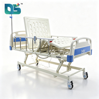 Lit médical électrique de physiothérapie à trois fonctions, élégant, léger, avec panneaux en ABS, barre en aluminium, roulettes silencieuses et coussin