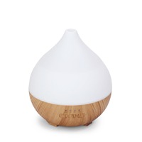 Diffuseur d'arômes et humidificateur USB sécurisé à effet bois avec arrêt automatique de la brume pour la chambre d'enfant, le coin bureau et l'étagère de la salle familiale