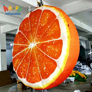 Modèle de tranche d'orange géante gonflable, ballon publicitaire personnalisé en forme de fruit des agrumes pour la promotion de bars à jus et les événements. - Product Image 1
