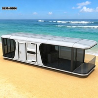 Maison conteneur modulaire type capsule spatiale, Tiny House, design postmoderne, options OEM personnalisées pour hôtels, bureaux, bâtiments et cuisines
