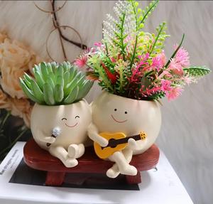 Sáng Tạo Nhựa Mặt Cười Chậu Hoa Hai Đầu Chơi Guitar Ca Hát Trồng Nồi Cho Cây Xương Rồng Mọng Nước Cây - Product Image 1