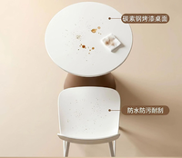 Table basse circulaire moderne minimaliste à pieds hauts pour l'extérieur, idéale pour les cafés et les espaces de loisirs