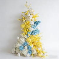 Décoration murale personnalisable en rangée de fleurs artificielles jaunes, bleues et blanches pour l'arrière-plan de la zone d'accueil de mariage et les vitrines de centre commercial