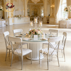 ชุดโต๊ะอาหารและเก้าอี้สแตนเลสสตีลทันสมัยสไตล์ดูไบ สำหรับใช้ในบ้าน อพาร์ทเมนต์ โรงแรม และกลางแจ้ง สำหรับงานจัดเลี้ยง สามารถปรับแต่งได้ - Product Image 1