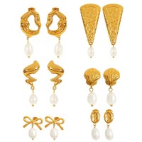 Boucles d'oreilles pendantes perle coquille spirale, acier inoxydable doré, inspiration marine, luxe discret femme