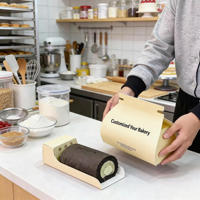 Boîte d'emballage de rouleau de serviette de gâteau cuit au four avec logo personnalisé imprimé rouleau suisse emballage de gâteau à main boîte de papier de gâteau d'ananas