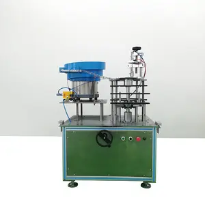 Automatic aerosol button placing machine for aerosol filling line