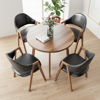 Ensemble de table et de chaises de salle à manger en marbre européen moderne et durable, mobilier de restaurant pour usage commercial