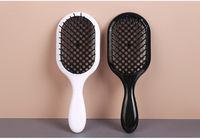 Brosse à cheveux démêlante imperméable pour femmes avec logo personnalisé, fonction de massage, poils en nylon, design rond - OEM/ODM disponible