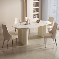 Table à manger scandinave de luxe en dalle de roche avec plateau en marbre, durable et écologique, combinaison de chaises 6 places pour petits appartements