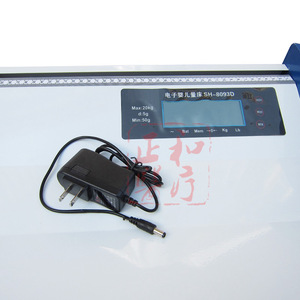 Cama electrónica para medir la altura y el peso de bebés con bandeja de báscula, forma rectangular, funciona con pilas recargables. - Product Image 3