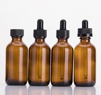 60ml 2oz Bernsteinfarbene Boston Rundflaschen aus Glas für Ätherische Öle & Haarpflege mit Markiertem Tropfer Siebdruck Individuelle Farben