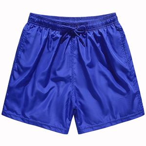 Pantaloncini da spiaggia Casual in poliestere 100% ad asciugatura rapida barts elasticizzati in vita traspirante con motivo solido a prova di Logo a metà - Product Image 6