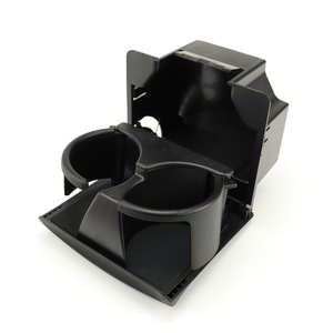 Porte-gobelets central noir ordinaire Nissan STK-0036 2008-2015 en plastique à double compartiment - Product Image 1