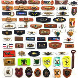 جلد مخصص مع شعار مخصص للخياطة على الجينز أصلي ، ملصق ملابس من المطاط - Product Image 1